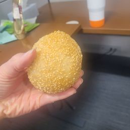 Huge sesame ball filled w red bean paste Huge sesame ball filled w red bean paste