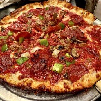 Paisans Pizzeria - Supreme pizza with caramelized crust - Pizza Near Me - Lisle, Illinois