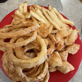 Boston's Fish House - Lunch portion half fried cod and fried shrimp with fries and onion rings. Order a side of rose petal sauce. - Seafood Near Me - Winter Park, Florida