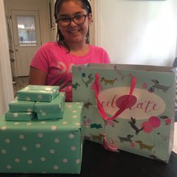 The cute doggie birthday bag & beautiful polka dot wrapping paper was definitely a hit with my niece Sofia.