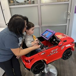 She had him feel the vibration of the hair clippers before using it on him. So smart! She had him feel the vibration of the hair clippers before using it on him. So smart!