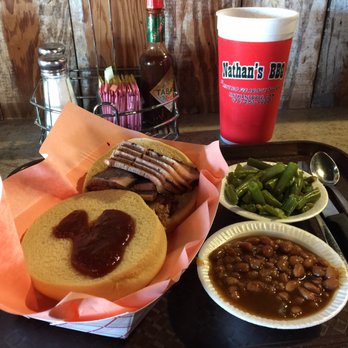 Nathan's BBQ - Sliced brisket sandwich with baked beans and green beans. - Barbeque Near Me - Brenham, Texas