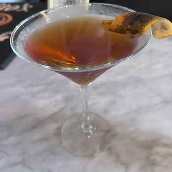 The Grove - Smoked Peach Manhattan-Oh wow. So good. They have to warn you it's very strong. But you can't tell when you drink it. - Bars Near Me - Savannah, Georgia The Grove - Smoked Peach Manhattan-Oh wow. So good. They have to warn you it's very strong. But you can't tell when you drink it. - Bars Near Me - Savannah, Georgia