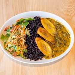 Rawtopia Living Cuisine and Beyond - Egusi is a West African classic, cooked down greens, with ginger, pumpkin seed, local peppers, and unrefined Ghanian palm oil.