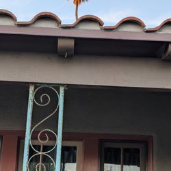 Fritts Roofing & Repair Company - Misaligned roof tiles. For proper drainage to avoid water damage, tiles must overlap at the edges. This had to be redone.