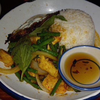Glai Baan - Pad Prik King ($16), Chinese long bean, kaffir lime, curry paste, fried egg + we chose to add chicken. - Thai Near Me - Phoenix, Arizona