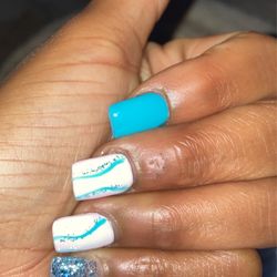 Nail Tulip - Tina does my nails and she does a bomb job especially with my designs and color themes