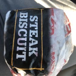 McDonald's - Hardee's delicious steak biscuit served fast hot and tasty.