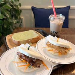 Lavena Cafe - (Back Left) pandan custard toast (back right) regular boba (left) pork belly bao (right) cod fillet bao