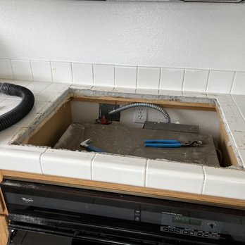 Direct Connect Connections - Tile countertop opening enlarged 1.5" to accommodate the new GE cooktop - Appliances & Repair Near Me - Brea, California Direct Connect Connections - Tile countertop opening enlarged 1.5" to accommodate the new GE cooktop - Appliances & Repair Near Me - Brea, California