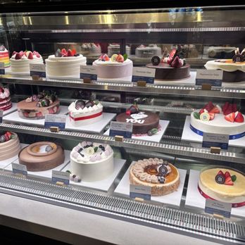 Paris Baguette - Cakes. Each section of the rainbow taste like the colour it represents so do not be alarmed when you taste the rainbow - Bakeries Near Me - Cary, North Carolina