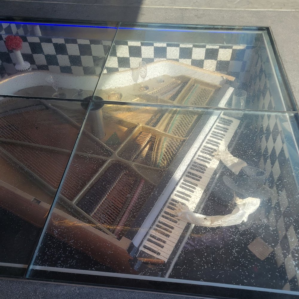 Big Rock Pub - The underground skeleton piano player at the enterence. - American Near Me - Indio, California