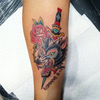 Chris Haley Tattoos - Tattoo of wolf with a dagger and rose - Tattoo Near Me - Chandler, Arizona