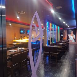 Tomo Sushi - Grill - Booth and table options, plus a small bar area