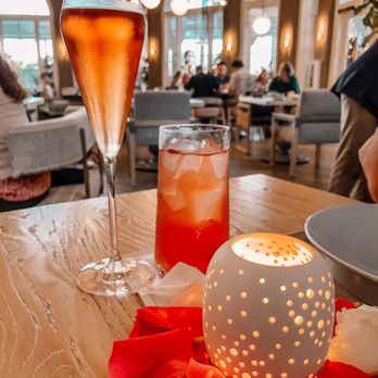 Knife & Spoon - Mocktail and rose - Seafood Near Me - Orlando, Florida Knife & Spoon - Mocktail and rose - Seafood Near Me - Orlando, Florida
