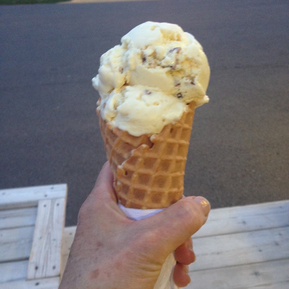 Sunny's Dairy Bar - Medium butter pecan in a waffle cone - Ice Cream & Frozen Yogurt Near Me - Summerside, Prince Edward Island Sunny's Dairy Bar - Medium butter pecan in a waffle cone - Ice Cream & Frozen Yogurt Near Me - Summerside, Prince Edward Island