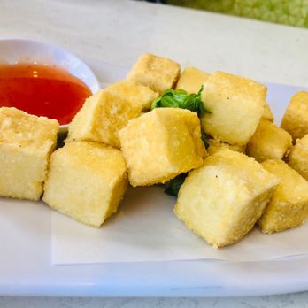 Pho Anh - a plate of tofu and a bowl of sauce - Vietnamese Near Me - Riverside, California