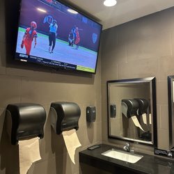 Duffy's Sports Grill - TV in the restroom