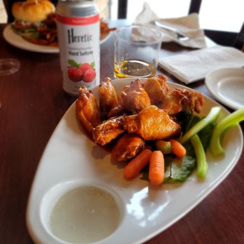 Slanted Tree Kitchen & Taproom - Buffalo wings, Heretic raspberry hard seltzer, shot of Jameson. - Burgers Near Me - Fairfield, California Slanted Tree Kitchen & Taproom - Buffalo wings, Heretic raspberry hard seltzer, shot of Jameson. - Burgers Near Me - Fairfield, California