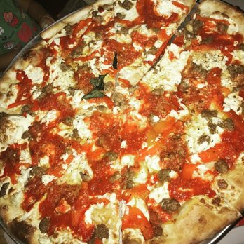 Grimaldi's Pizzeria - Brooklyn Bridge - Oven Roasted Red Peppers, Creamy Ricotta Cheese And Hand Pinched Italian Sausage, atop Our Traditional Pizza. - Pizza Near Me - Gilbert, Arizona