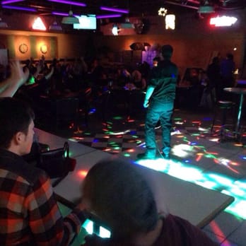 H2O Lounge - two people playing a video game - Lounges Near Me - Edmonton, Alberta H2O Lounge - two people playing a video game - Lounges Near Me - Edmonton, Alberta