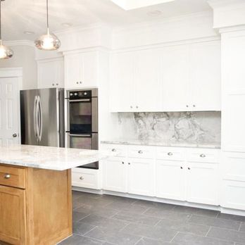 Ais Stone & Marble - a kitchen with a marble island - General Contractors Near Me - Missouri City, Texas Ais Stone & Marble - a kitchen with a marble island - General Contractors Near Me - Missouri City, Texas