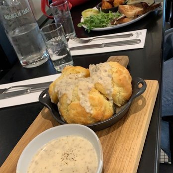 Magnolia Table - Biscuits & Jo's Buttermilk Biscuits with Sausage Gravy (4) Breakfast sandwich - Breakfast & Brunch Near Me - Waco, Texas
