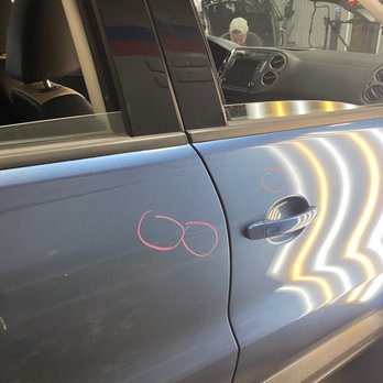 Pro Dent Hail Center - Marking the dents for fixing. - Body Shops Near Me - Fort Collins, Colorado Pro Dent Hail Center - Marking the dents for fixing. - Body Shops Near Me - Fort Collins, Colorado
