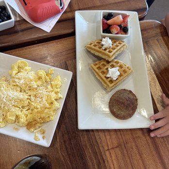 Sleepy Rooster Morning Kitchen - Kids breakfast. Waffle came with four pieces and fruit Second meal came with Eggs, sausage and fruit! Was great to split with two kids! - Breakfast & Brunch Near Me - New Albany, Indiana Sleepy Rooster Morning Kitchen - Kids breakfast. Waffle came with four pieces and fruit Second meal came with Eggs, sausage and fruit! Was great to split with two kids! - Breakfast & Brunch Near Me - New Albany, Indiana