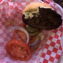 Tomato sandwich with a side of burnt burger.