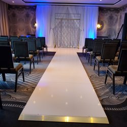 La Vie Event Rentals - La Vie Event Rentals is at Van Zandt Hotel, Austin. Featuring our candle wall and glossy isle flooring.