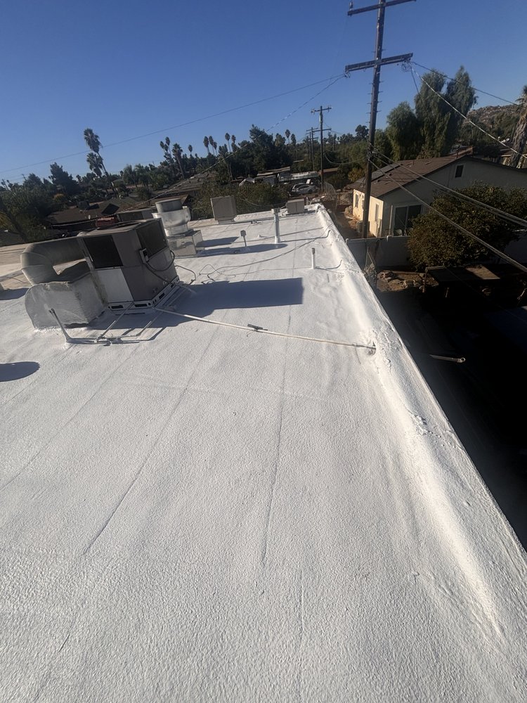 Slide of Troy Construction Roof & Solar