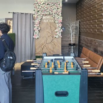 Jasmine Kocha - Foosball table and flower wall - Coffee & Tea Near Me - San Jose, California Jasmine Kocha - Foosball table and flower wall - Coffee & Tea Near Me - San Jose, California
