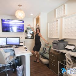 Moonlight Beach Dental - Lani our office manager showing you one of our private consultation spaces