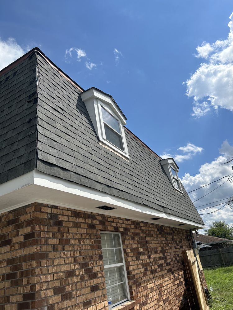 Slide of Red Lion Roofing