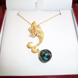 Starbird Jewelers - 14K gold and mermaid with carved Tahitian pearl from Gallatea jewlery