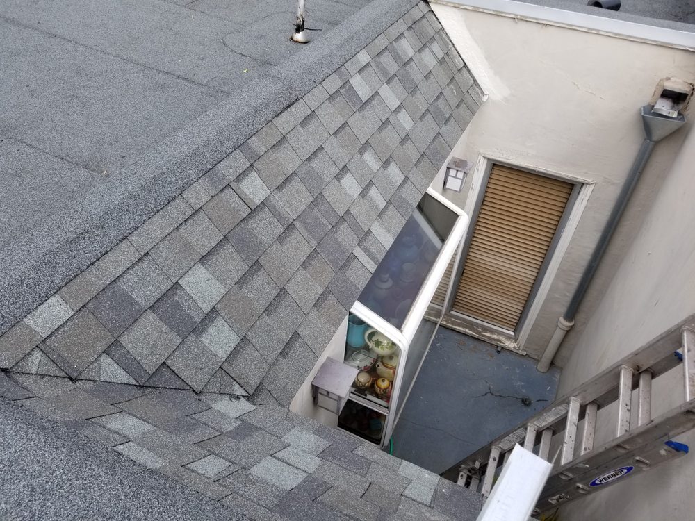 Slide of JK Pro Roofing