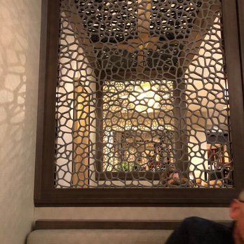 Copper Fox Midway - a man sitting in front of a mirror - Gastropubs Near Me - Chicago, Illinois