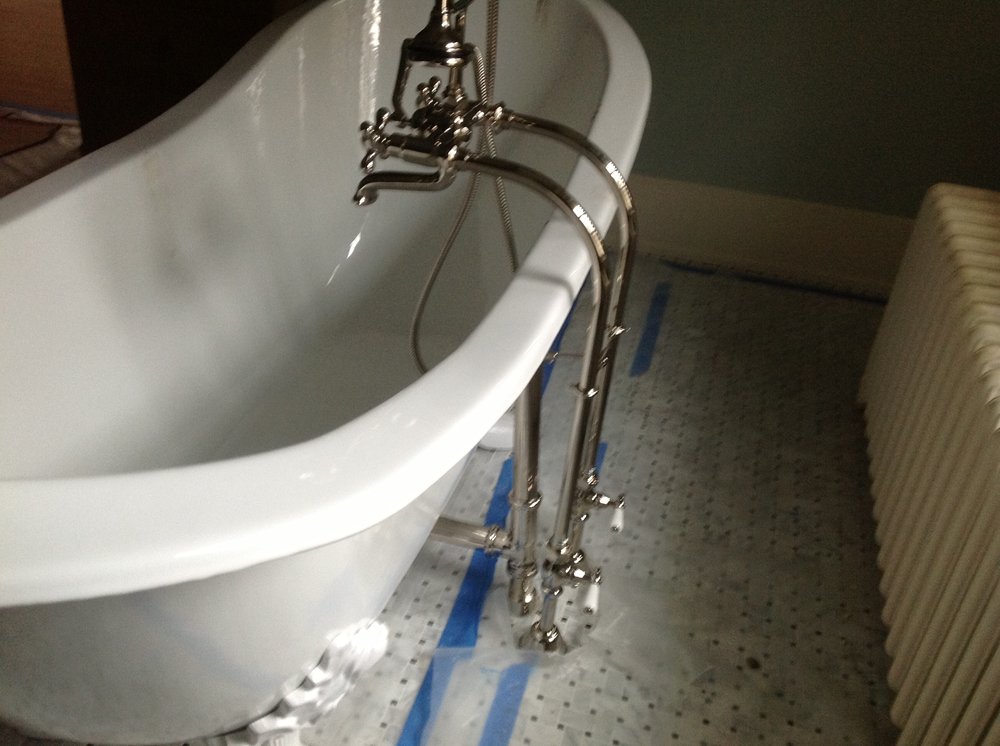 Slide of Deluxe Plumbing & Heating