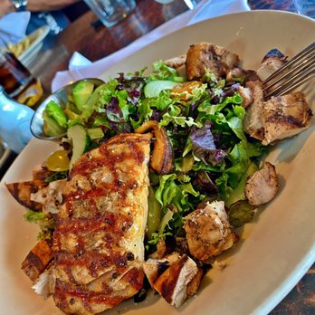 Sierra - Salmon and Chicken and Avocado on a House Salad - American Near Me - Lone Tree, Colorado Sierra - Salmon and Chicken and Avocado on a House Salad - American Near Me - Lone Tree, Colorado