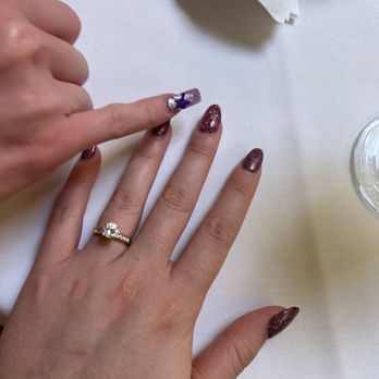 Moon Nails & Spa - My sister pointing out the nail that was originally broken. - Nail Salons Near Me - Albuquerque, New Mexico