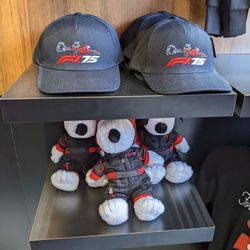 The F1 Hub - F1 Snoopy hat and plushie