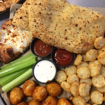 Chuck E. Cheese - Tater tots, garlic bread, cheesy bread, boneless wings, celery, ranch, salsa, & ketchup!:) - Pizza Near Me - Moreno Valley, California Chuck E. Cheese - Tater tots, garlic bread, cheesy bread, boneless wings, celery, ranch, salsa, & ketchup!:) - Pizza Near Me - Moreno Valley, California