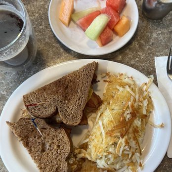 Encinitas Cafe - Bacon and egg sandwich with a side of fruit. - Breakfast & Brunch Near Me - Encinitas, California