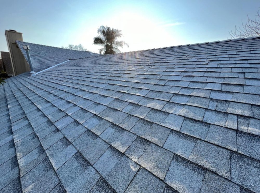 Slide of Akurate Roofing Group