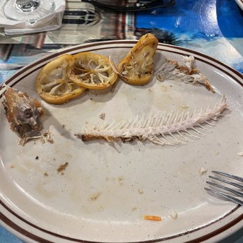 Nini's Cuban Cuisine - Ummmmm. The remains of the fried red snapper!! Lol - Cuban Near Me - Indialantic, Florida Nini's Cuban Cuisine - Ummmmm. The remains of the fried red snapper!! Lol - Cuban Near Me - Indialantic, Florida
