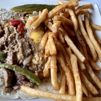 Molly's Restaurant & Bar - Philly cheesesteak with extra cheese. - American Near Me - Hanover, New Hampshire