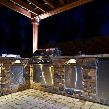 New Beginnings Landscape - outdoor kitchen at night - Landscape Architects or Designers Near Me - Nashville, Tennessee New Beginnings Landscape - outdoor kitchen at night - Landscape Architects or Designers Near Me - Nashville, Tennessee