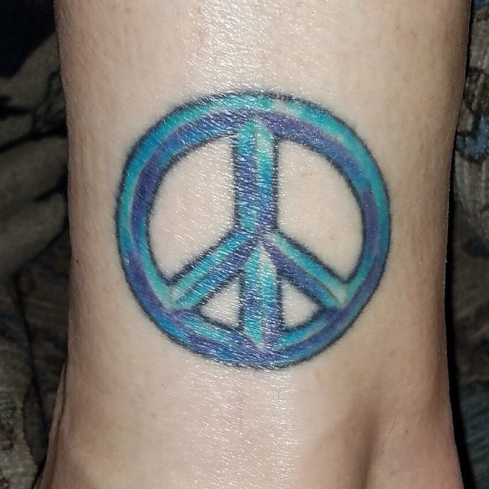 Under the Needle Tattoo - 2003. Damn that's a long time ago, but this tat still looks good. - Tattoo Near Me - Kirkland, Washington Under the Needle Tattoo - 2003. Damn that's a long time ago, but this tat still looks good. - Tattoo Near Me - Kirkland, Washington