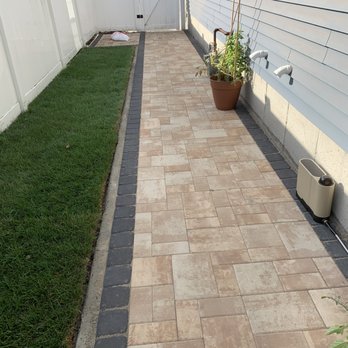 Figueroa’s Landscaping & Masonry - a brick walkway in a backyard - Masonry/Concrete Near Me Figueroa’s Landscaping & Masonry - a brick walkway in a backyard - Masonry/Concrete Near Me
